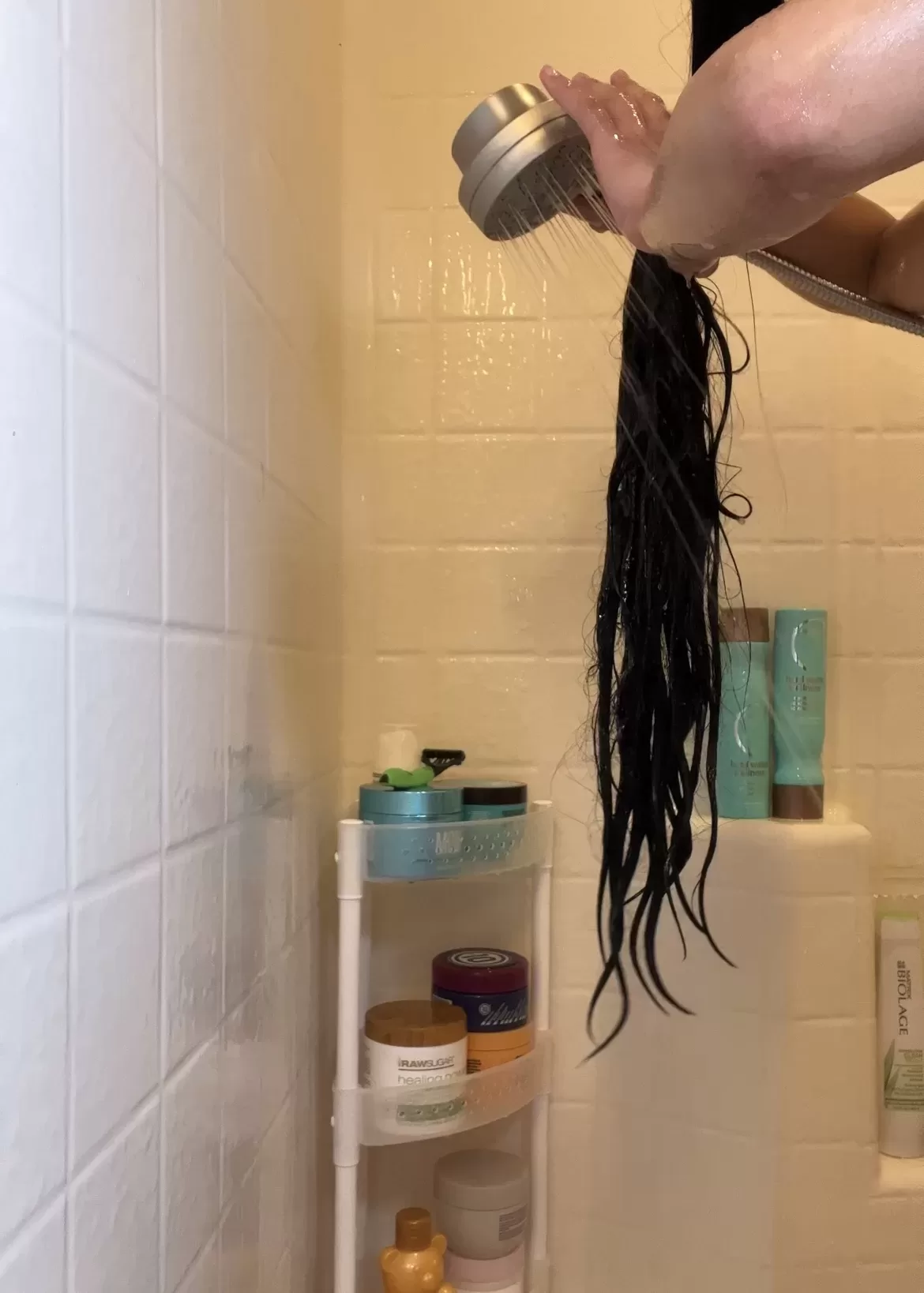 long hair rinsing in the shower
