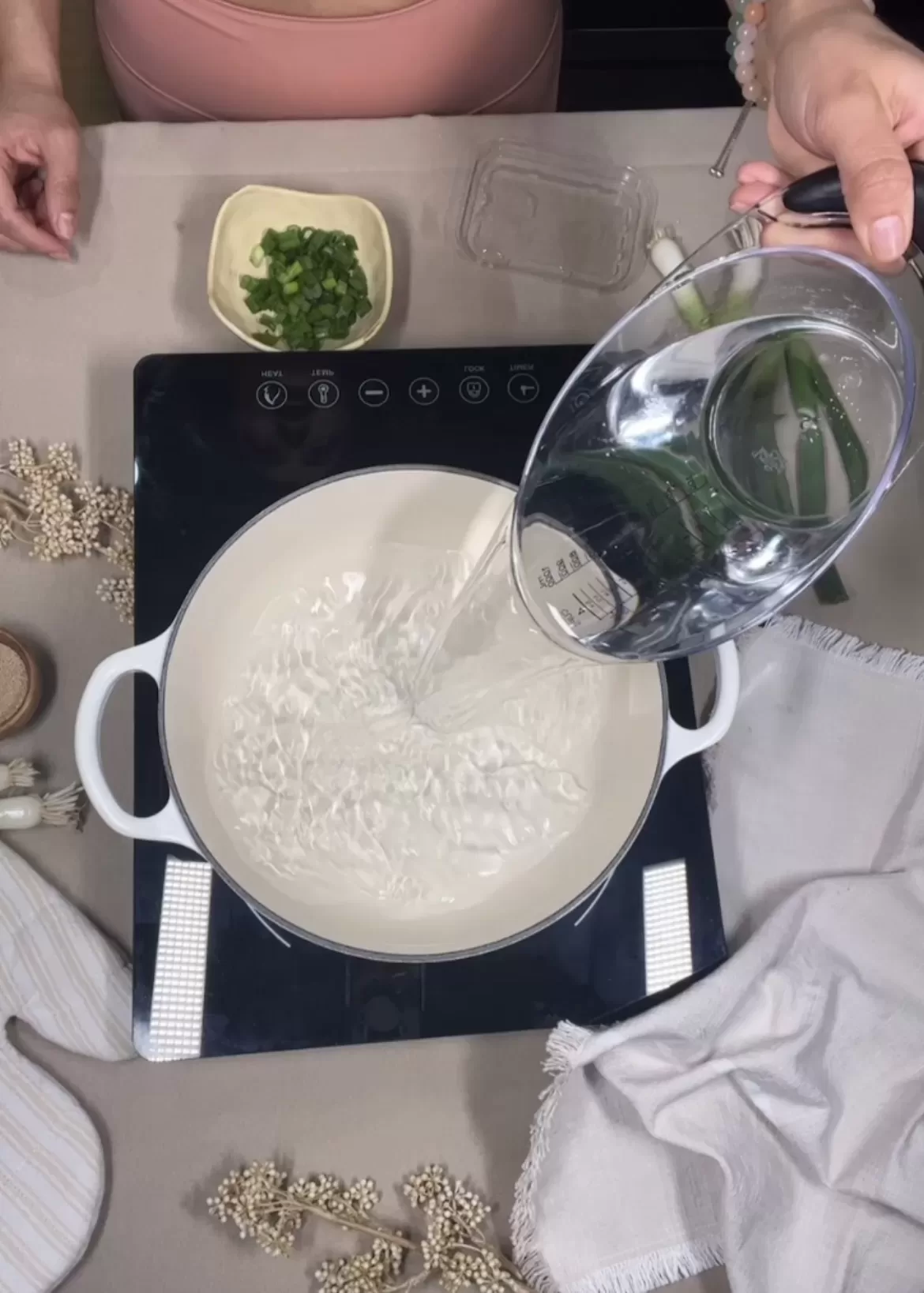 adding water to a le creuset saucepan